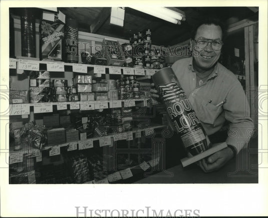 1989 Press Photo Luke LaBruzza shows off his wares at family's fireworks booth - Historic Images