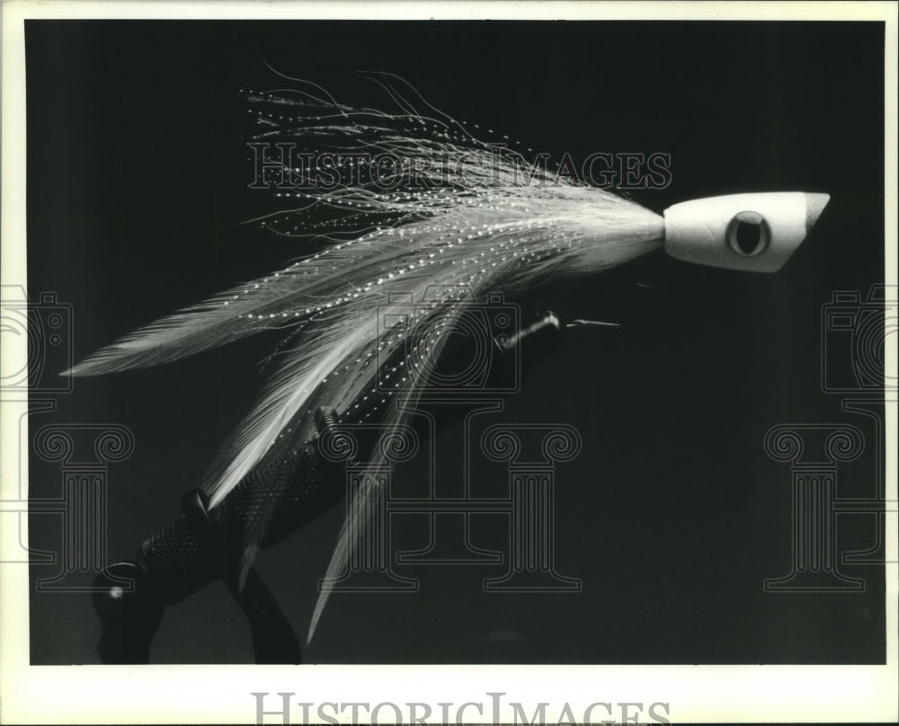 1990 Press Photo Combination Deceiver/Popper fly fishing lure. - nob09547 - Historic Images