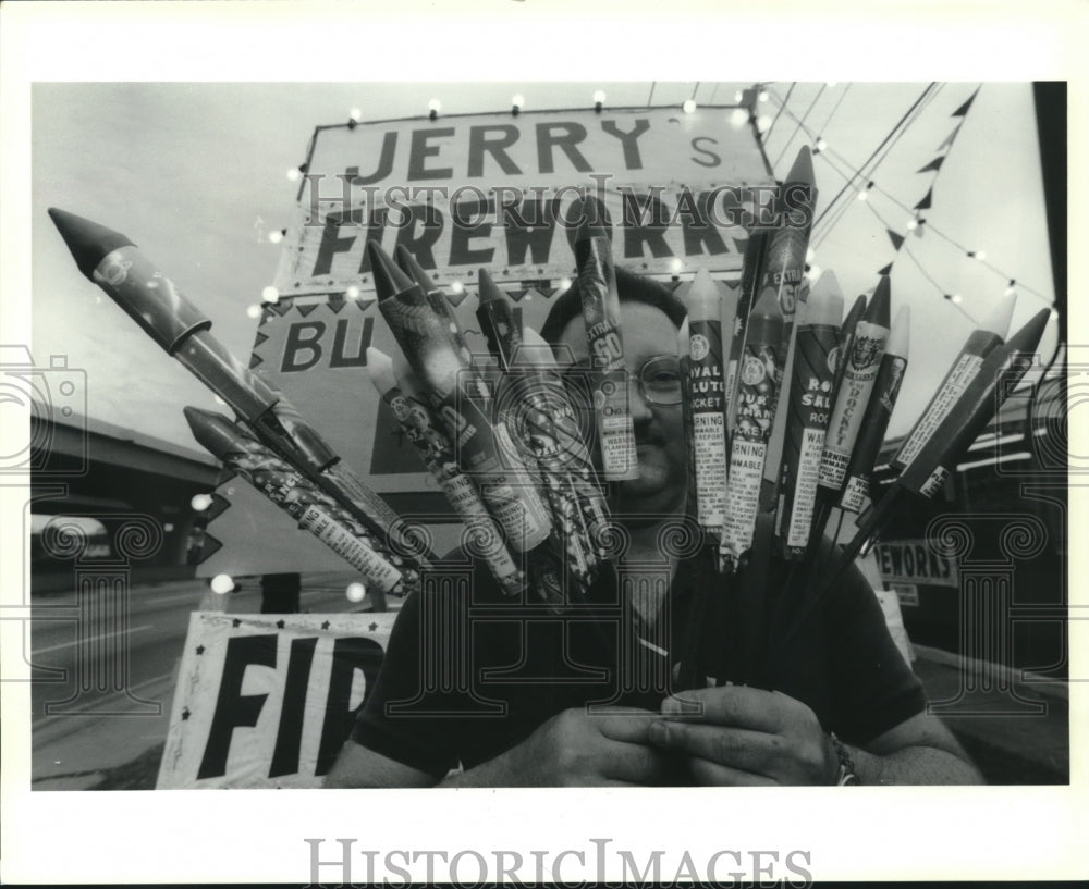 1992 Press Photo Jerry Verges Jr. displays fireworks at Jerry&#39;s Fireworks stand - Historic Images