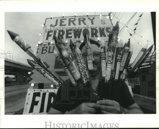 1992 Press Photo Jerry Verges Jr. displays fireworks at Jerry's Fireworks stand - Historic Images