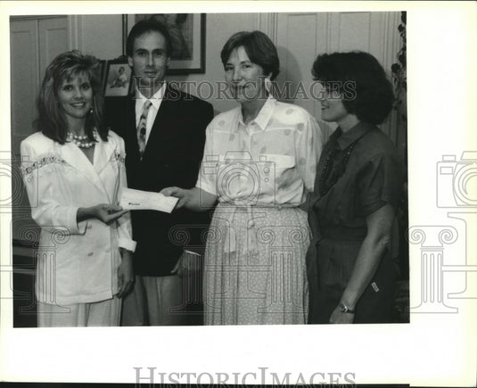 1991 Press Photo Sandy & Ron Franco present check to Bone Marrow representatives - Historic Images