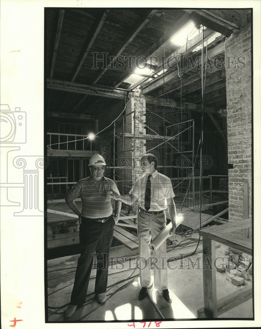 1987 Press Photo Thomas Finnegan,III & another look over warehouse renovation. - Historic Images