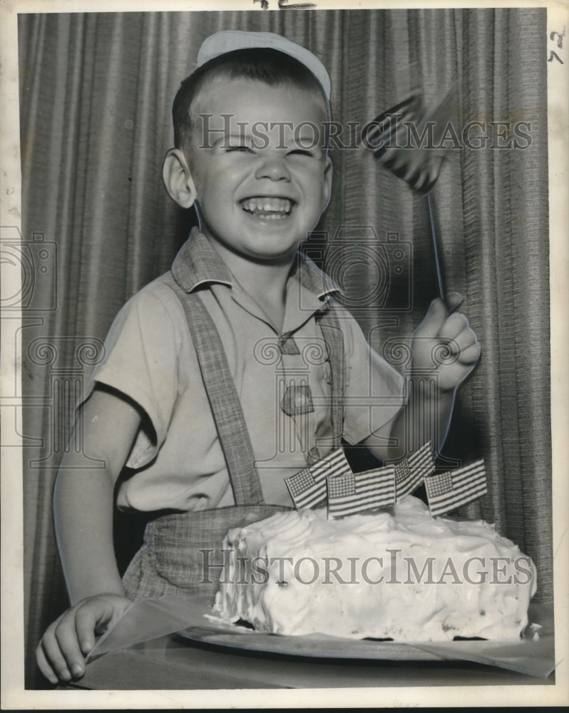 1958 Dick Waldrop celebrates his 4th birthday on July 4th. - Historic Images