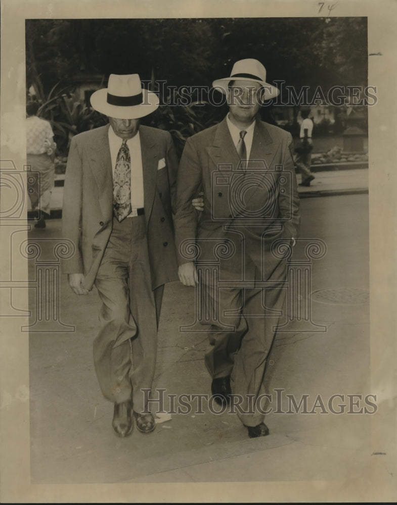 1951 John Fogarty and Attorney Coleman walking together-Historic Images