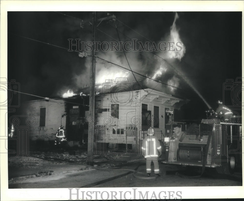 1991 Press Photo Firemen battle blaze of Thalia Street fire. - Historic Images