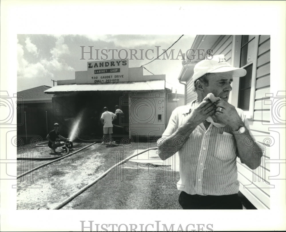 1990 Press Photo Joe Landry, owner of Landry&#39;s Cabinet Shop that Caught Fire - Historic Images