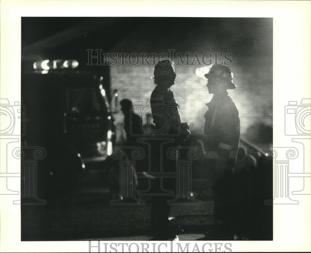 1990 Press Photo Harvey Vol Fire Department at 3529 Arapahoe Drive house fire - Historic Images