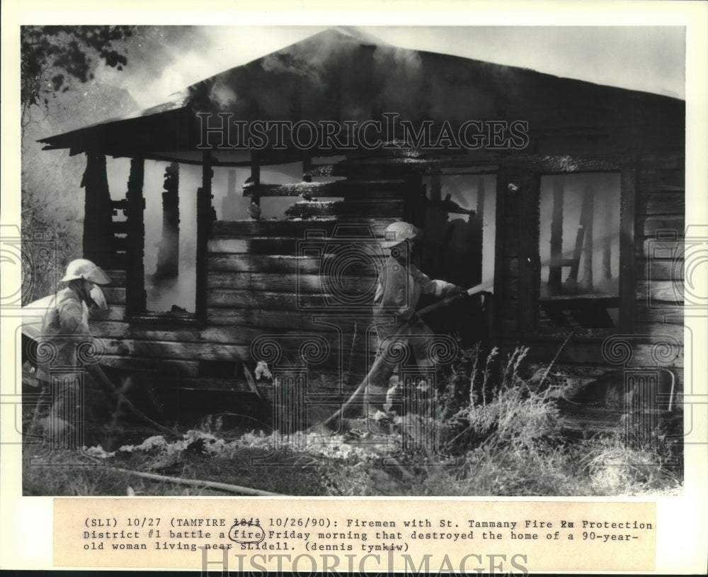 1990 Press Photo St Tammany Fire Protection District #1 battling fire in Slidell - Historic Images