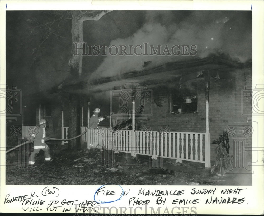 1990 Press Photo Firemen battling a home fire in Mandeville - nob10831 - Historic Images