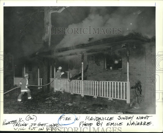 1990 Press Photo Firemen battling a home fire in Mandeville - nob10831 - Historic Images