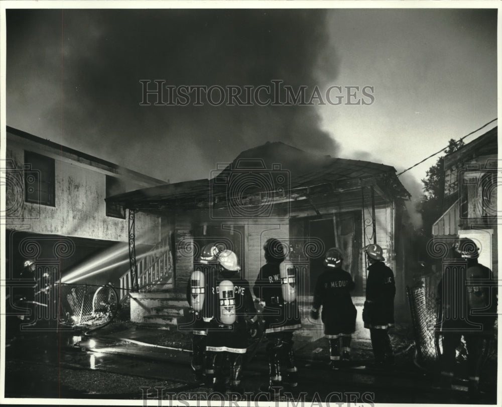 1987 Press Photo Firefighters outside house fire - nob11463 - Historic Images