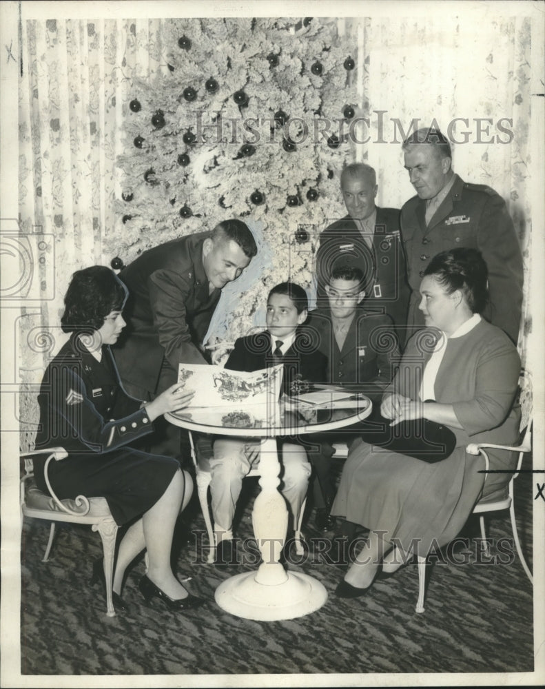 1965 Press Photo Bartet Fontan collects signatures on Christmas card for uncle - Historic Images