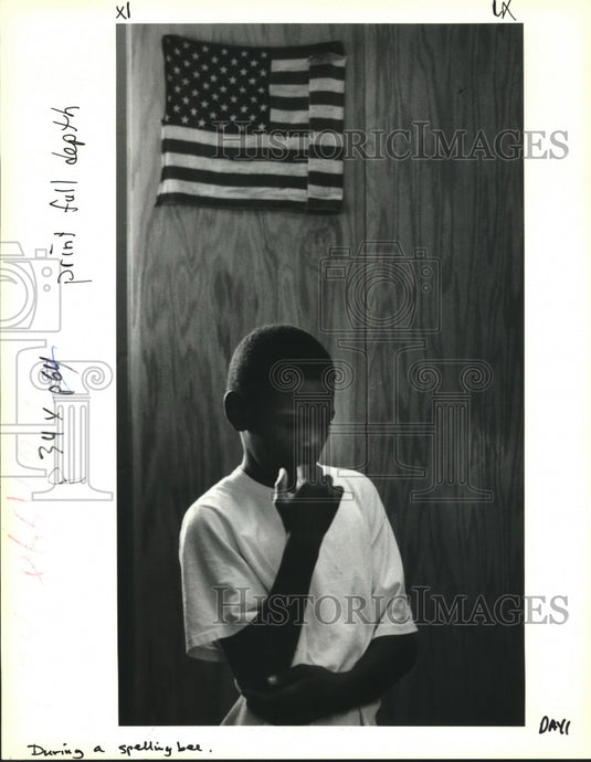 1992 Press Photo Sixth grade Moton School student concentrates on Spelling Bee - Historic Images