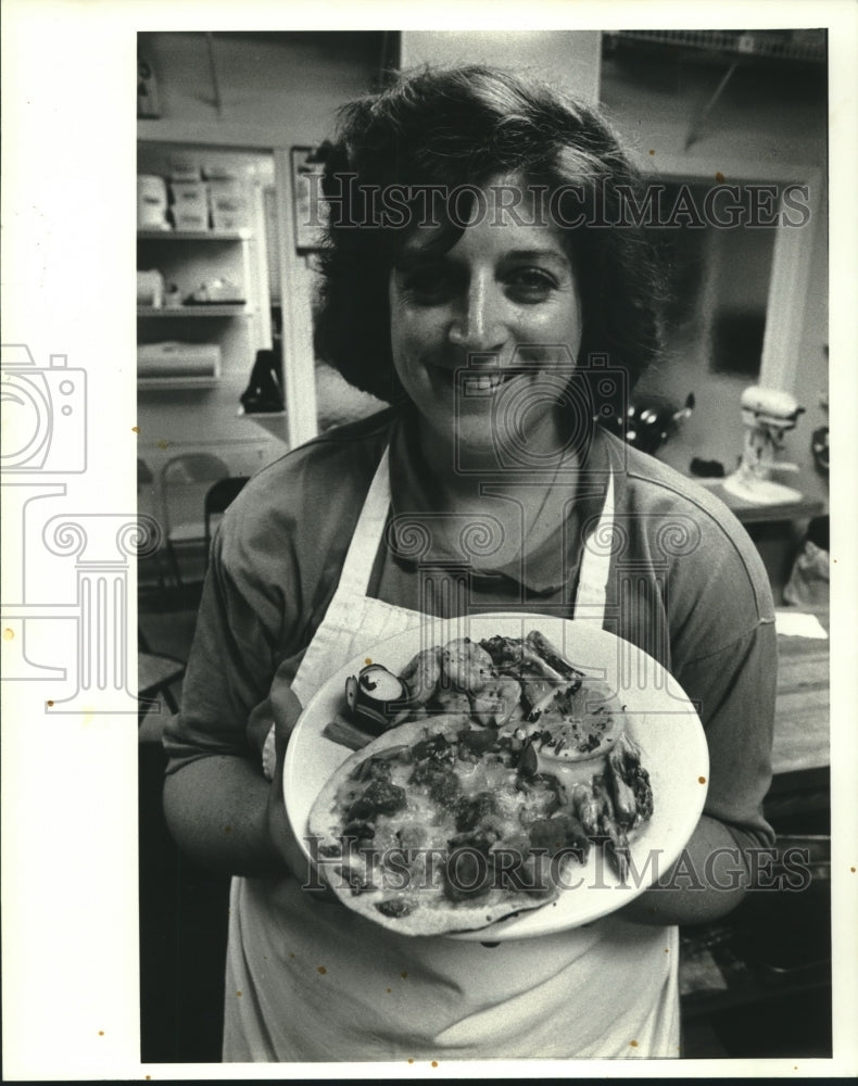 1987 Press Photo Renee Freeman displays her culinary creation. - nob11900 - Historic Images