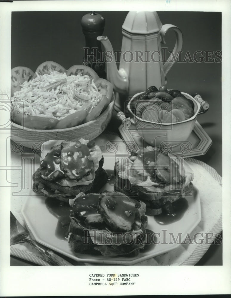 1983 Press Photo Capered pork sandwich with cole slaw and Vlasic pickles - Historic Images