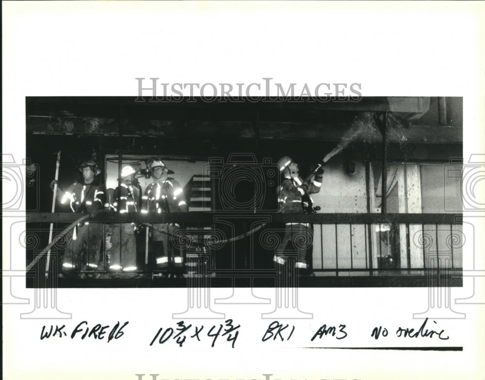 1883 Press Photo Firemen put out hot spots of Metairie fire that claimed a life - Historic Images