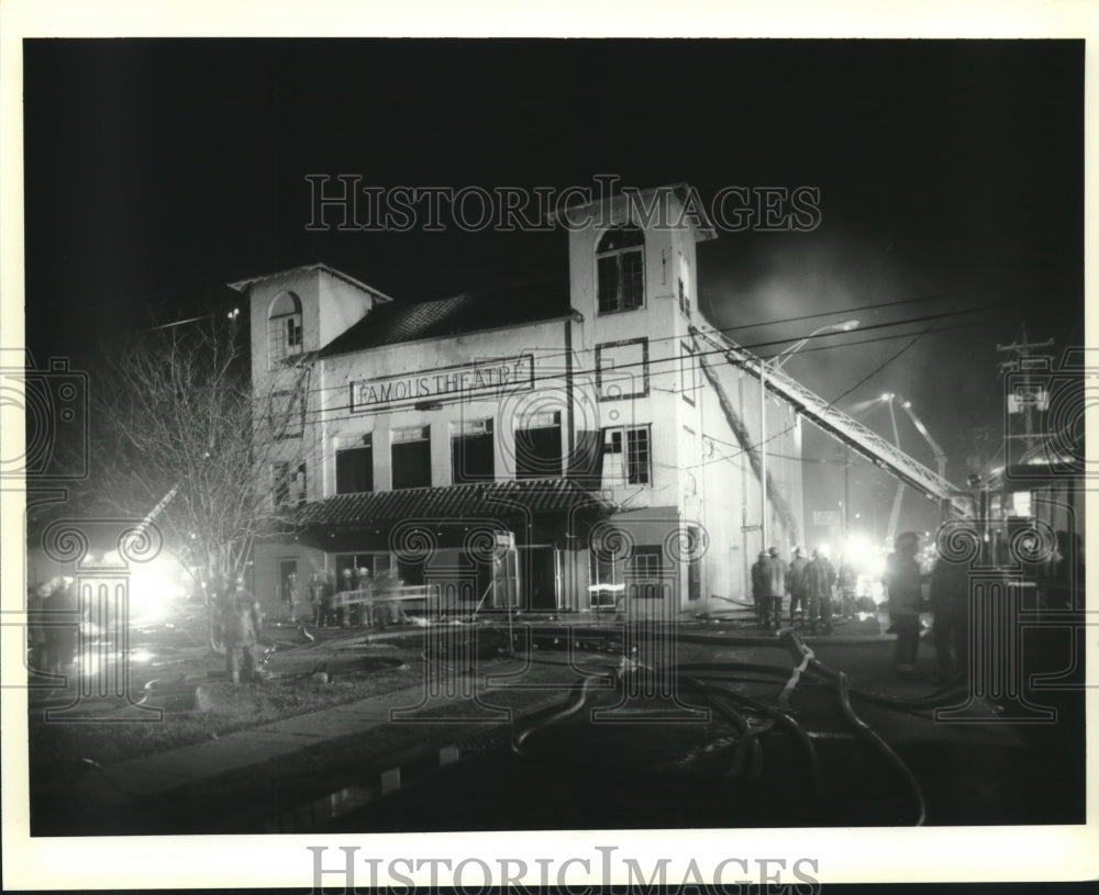 1993 Press Photo Firemen attack blaze at the Famous Theatre. - Historic Images