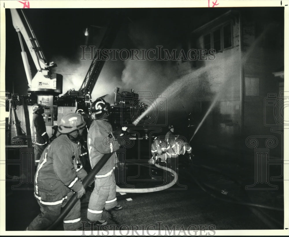 1992 Press Photo Firemen battle 7-alarm fire on St. Claude near Touro. - Historic Images