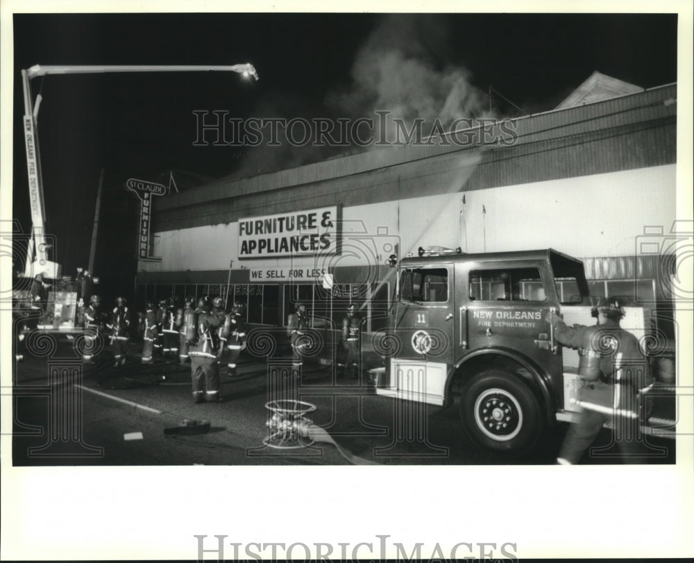 1993 Press Photo Firemen battling five alarm fire at St. Claude Furniture Store - Historic Images