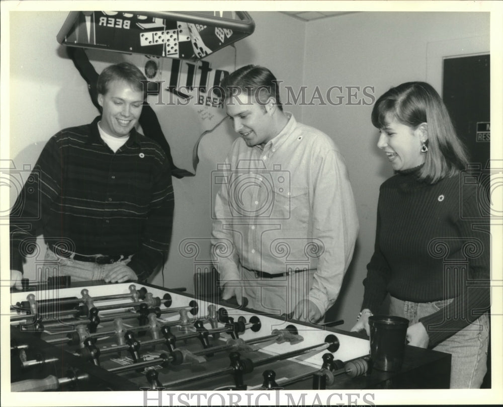 1993 Press Photo Guest playing Foosball at the Walshe Debutante Party - Historic Images