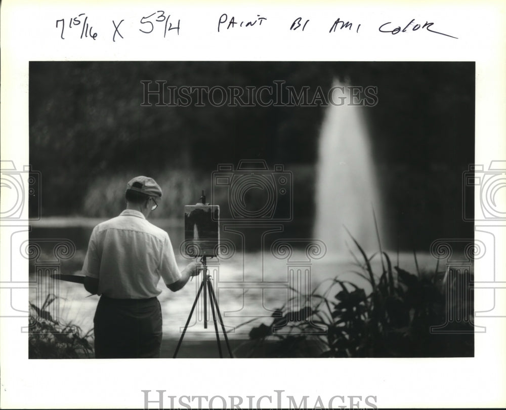 1993 Press Photo Mac Frazer paints a scene in one of the lagoons in Audubon Park - Historic Images