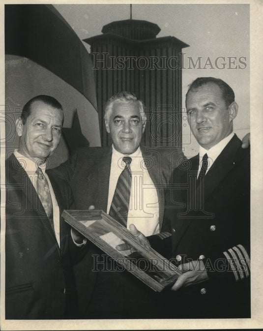 1969 Dock board presents portrait to Capt. Tonko Gamulin of MV Mosa - Historic Images