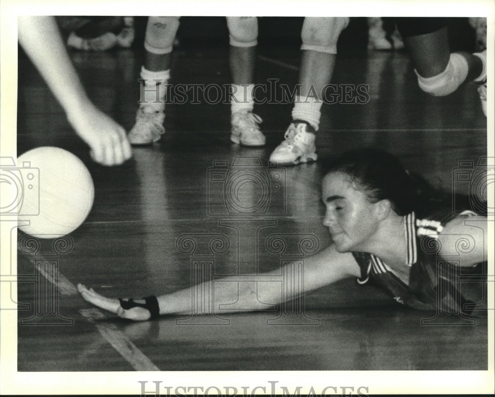 Alexia Tessier, Ben Franklin, dives for the ball - Historic Images