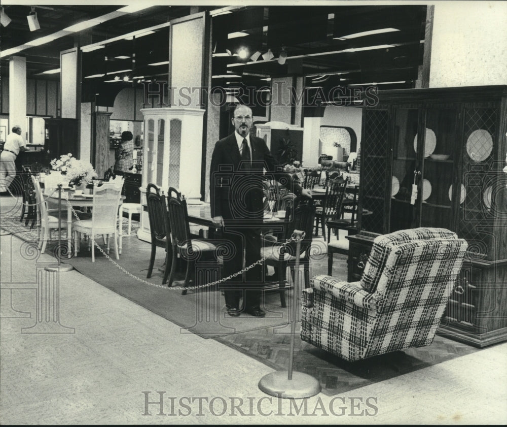1976 Press Photo Man Stands in Furniture Showroom - nob15566 - Historic Images