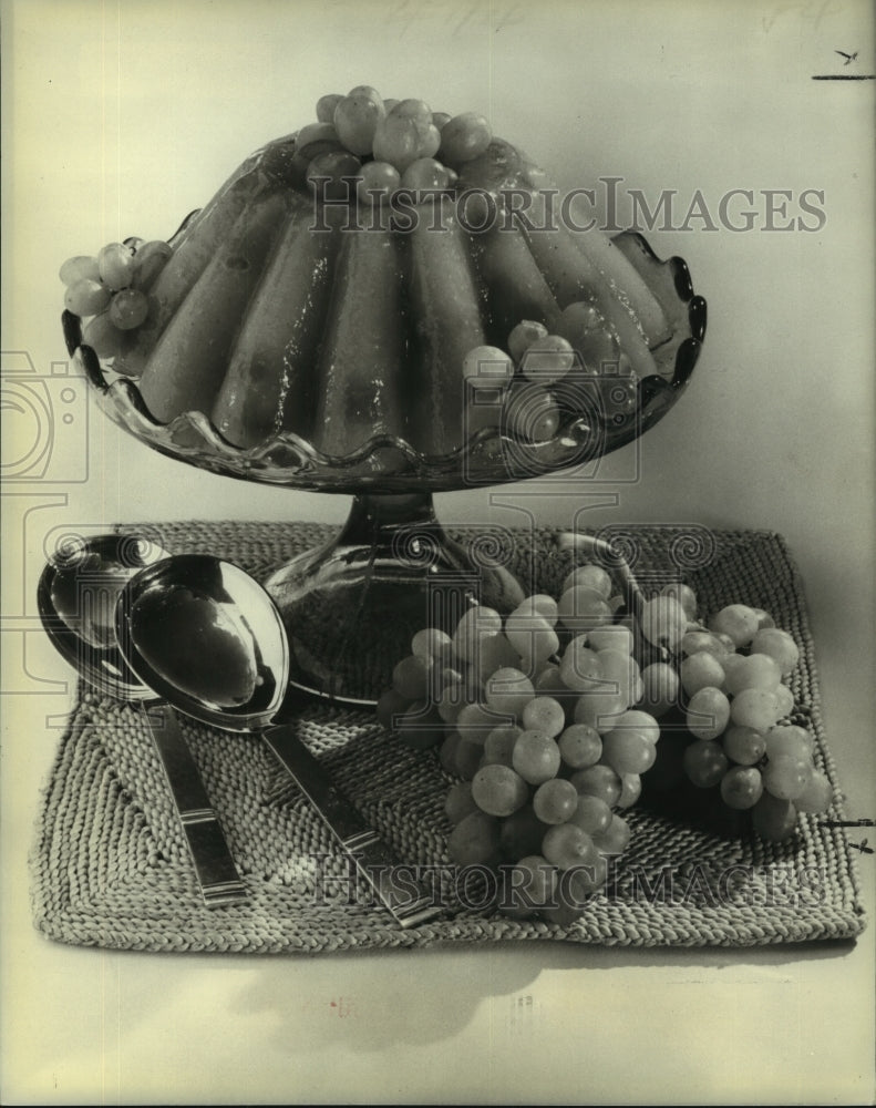 Golden Grape Aspic doubles as salad or dessert. - Historic Images