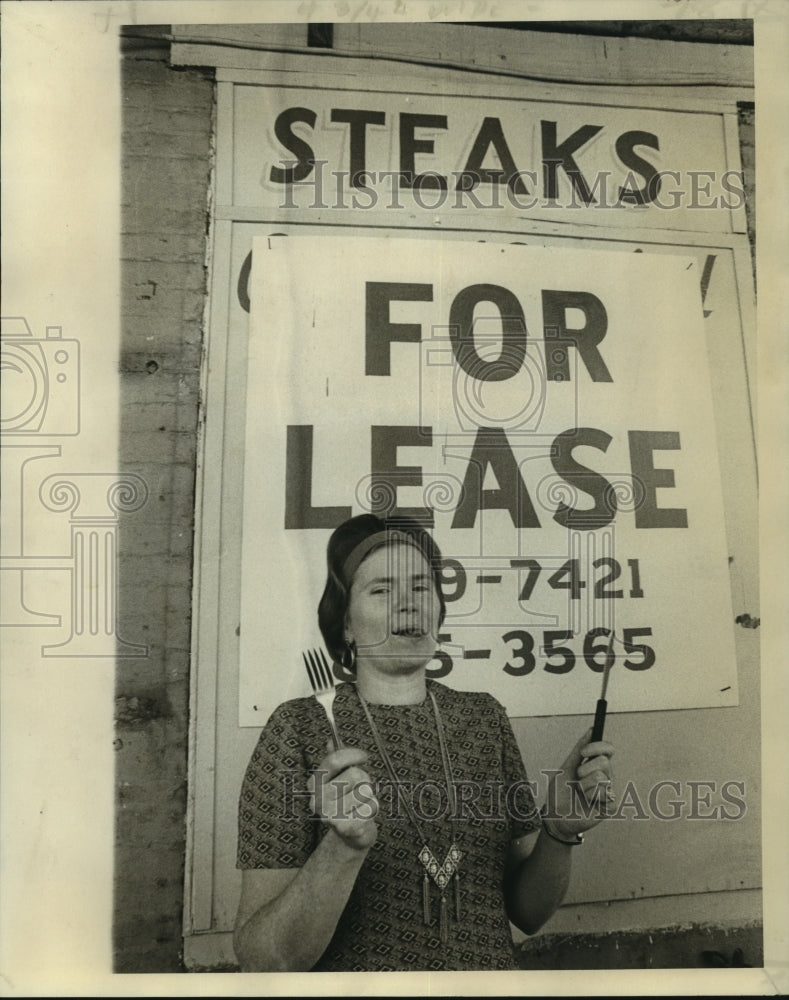 1973 Mrs. Jennie Garcia wonders---lease a steak or lease a building - Historic Images