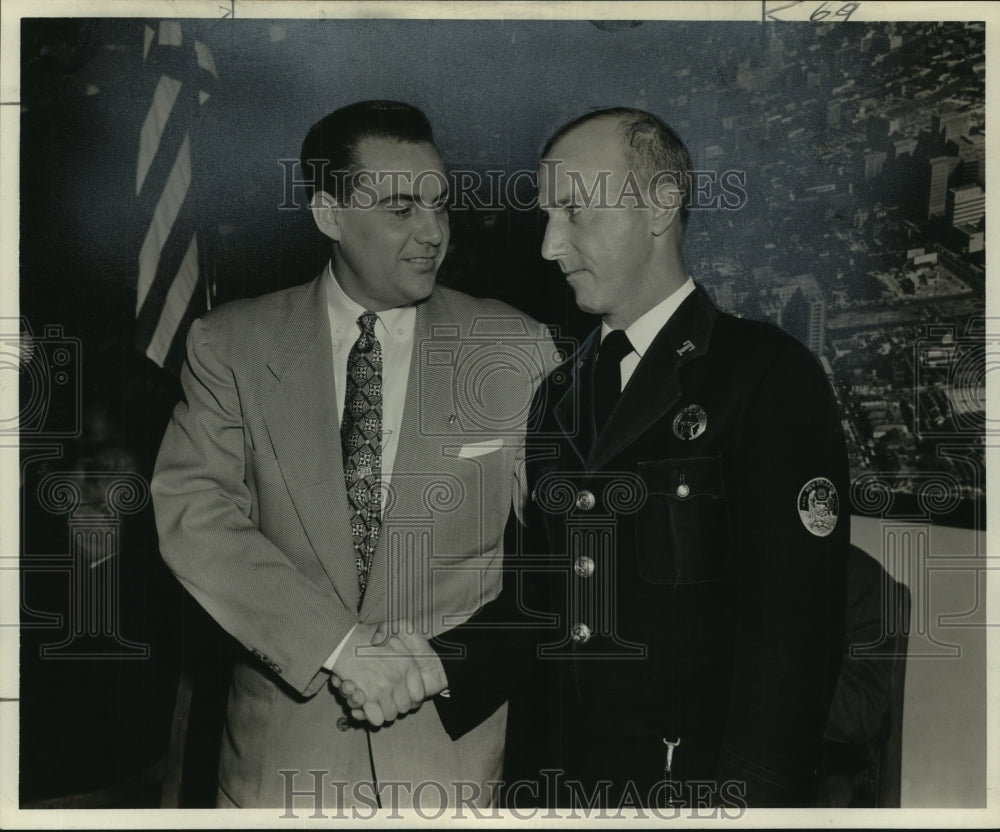 1955 Press Photo Patrolman Claude J. Gauthe receives city certificate of merit - Historic Images