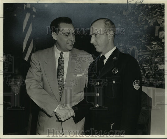 1955 Press Photo Patrolman Claude J. Gauthe receives city certificate of merit - Historic Images