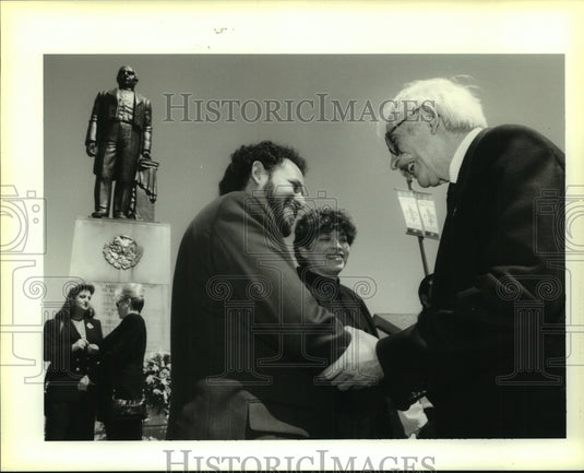 1996 Press Photo Luis & Rosa greet Agustin Garcia-Lopez at Juarez event - Historic Images