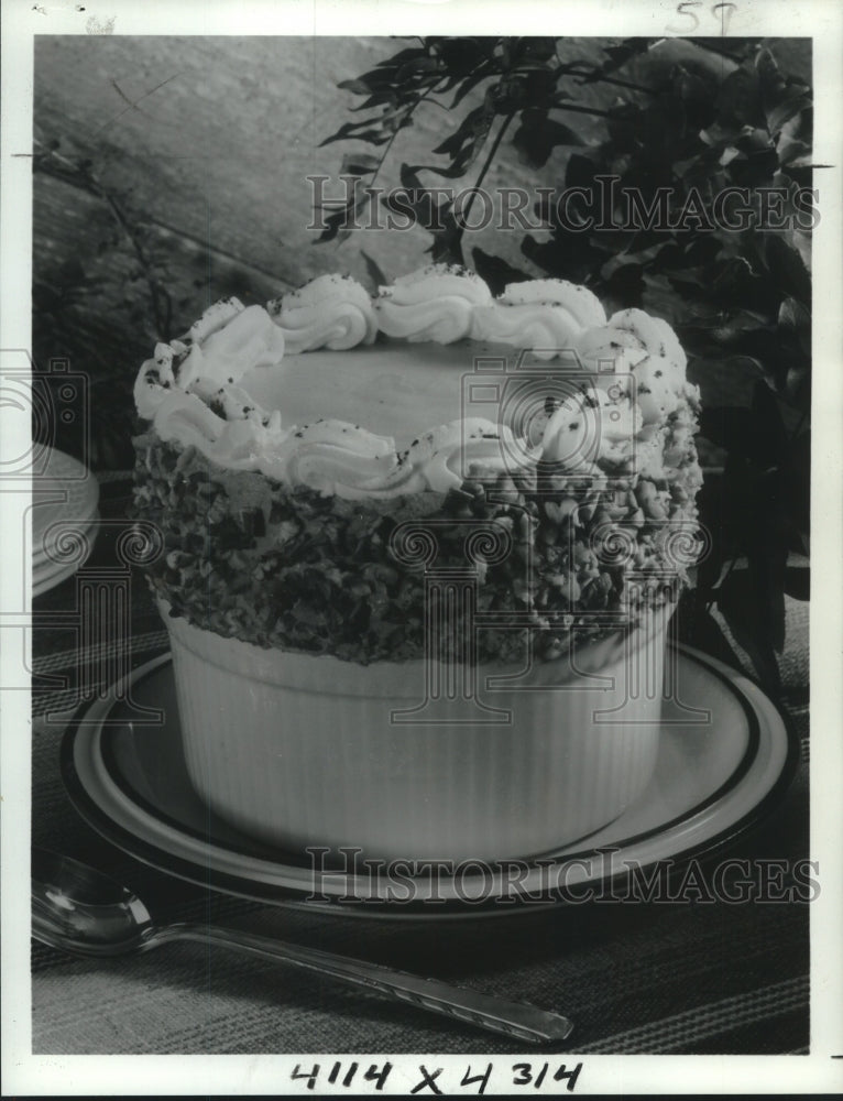 1980 Food - Kahlua Mousse presented with a flourish for grand finale - Historic Images