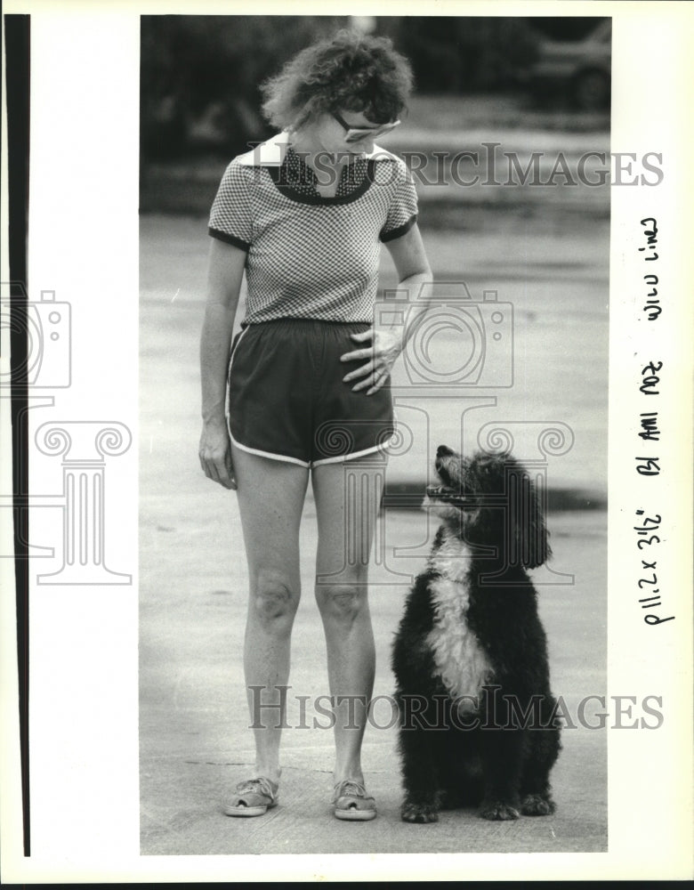 1992 Press Photo Myra Foster with Sonnet, 7-year-old Portuguese Water Dog. - Historic Images