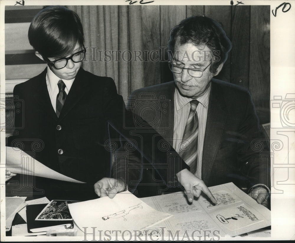 1970 Press Photo Checking layouts for book called Letters From Young Audiences - Historic Images