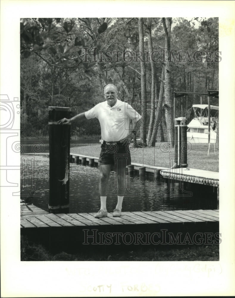 1993 Press Photo A man standing on a boat dock - Historic Images