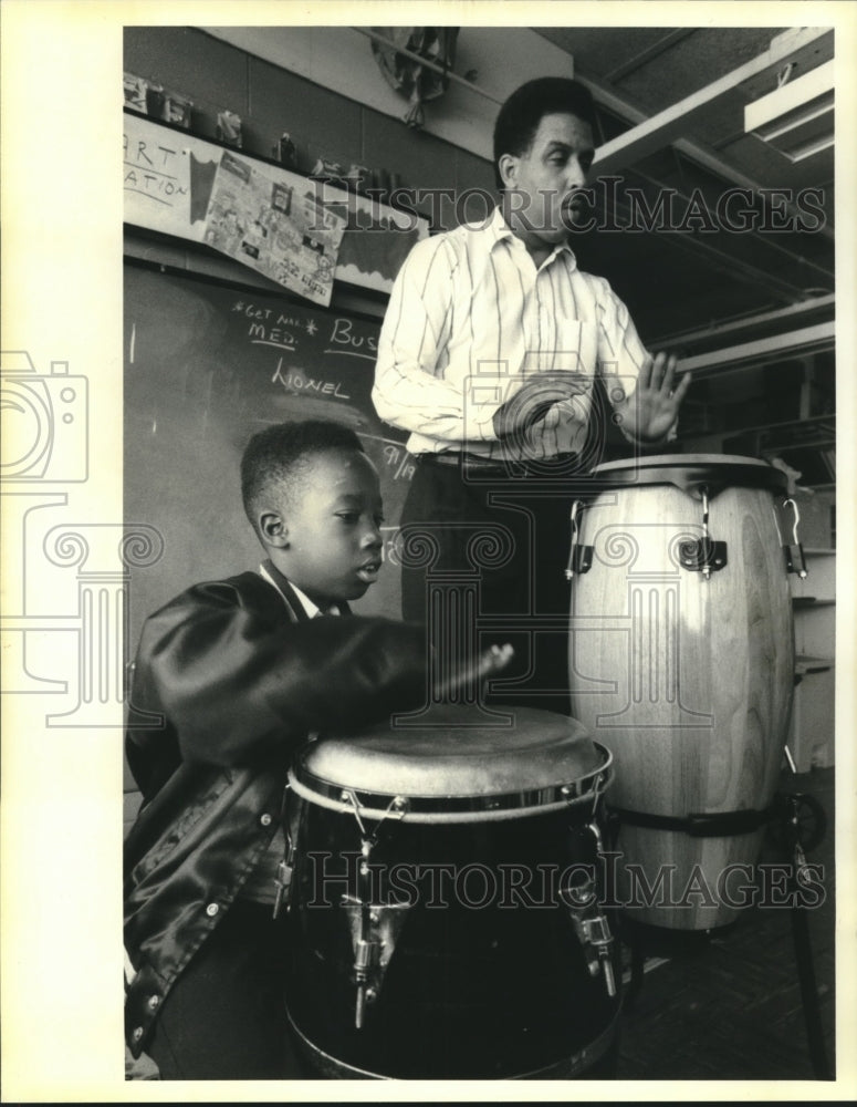 1992 Morris Stovall, student at McDonough Elementary in drum lesson. - Historic Images