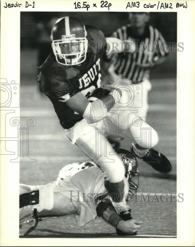 1993 Press Photo Jesuit RB #21 Todd Golemi barely escapes Ehret 57 Jim Matherne - Historic Images