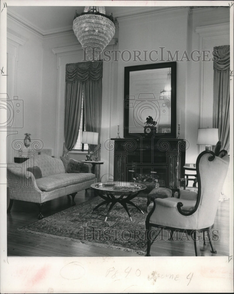 1967 Mahogany &amp; rosewood furnishings complimented by library drapes - Historic Images