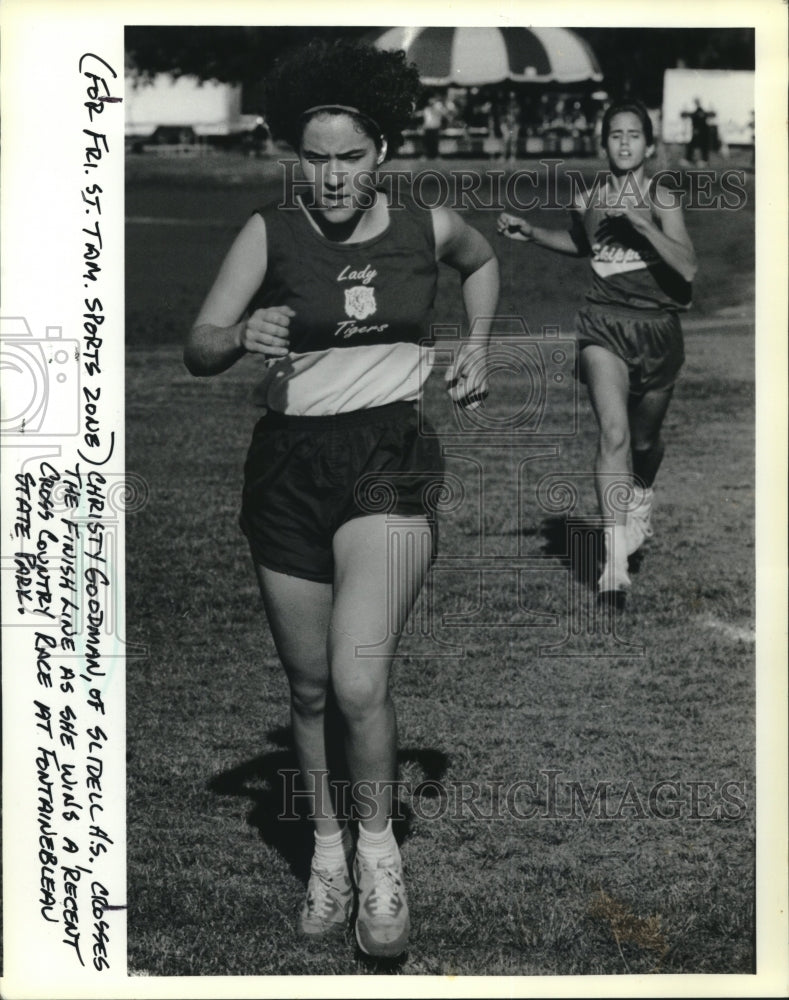 1990 Press Photo Christy Goodman, crosses finish line at Fontainebeau State Park - Historic Images