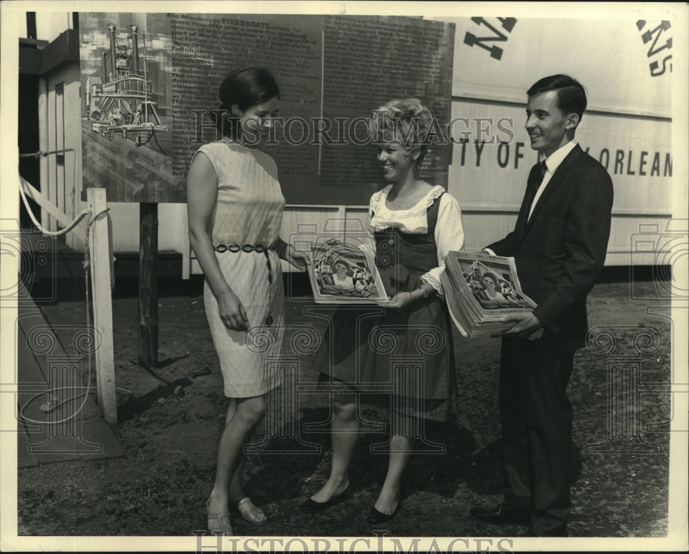 1968 Delegates distribute Times-Picayune copies at Berlin Volksfest - Historic Images