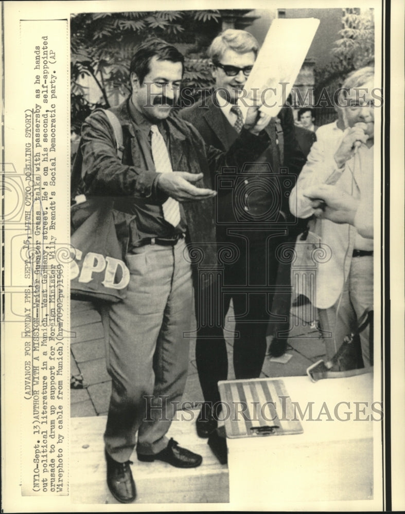 1969 Writer Guenter Grass hands out political literature, Munich-Historic Images