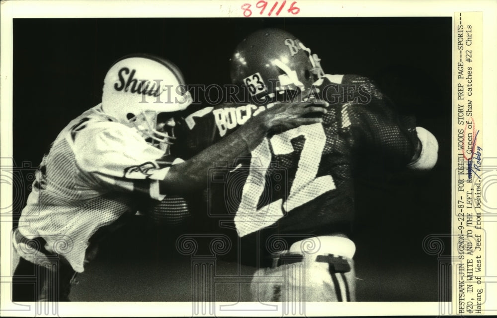 1987 Press Photo Robby Green of Shaw catches Chris Harang of West Jeff - Historic Images