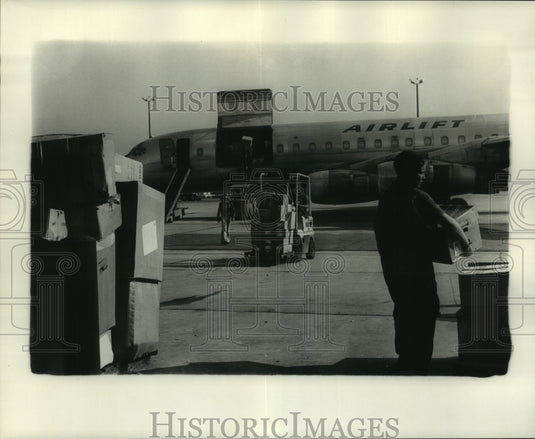 1976 Press Photo Guatemala Aid Supplies Loaded on Airplane - nob22419 - Historic Images