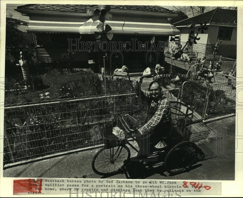 1995 Press Photo Dennis Guillot Sits on His Blue Tricycle in Front of His Home - Historic Images