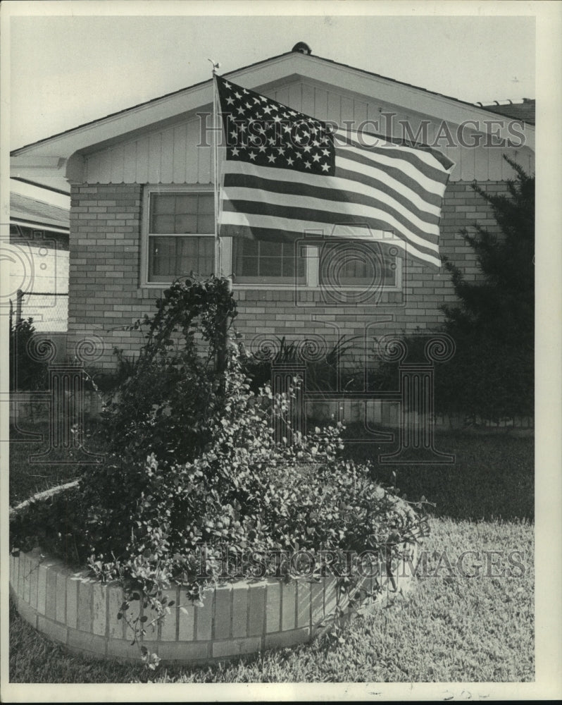 1969 American flag on display at the home of Mr. &amp; Mrs. Joseph Watz - Historic Images