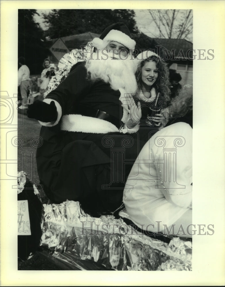 1989 Press Photo Jason Bland (Santa), Nicole Remondet, Gramercy Christmas Parade - Historic Images