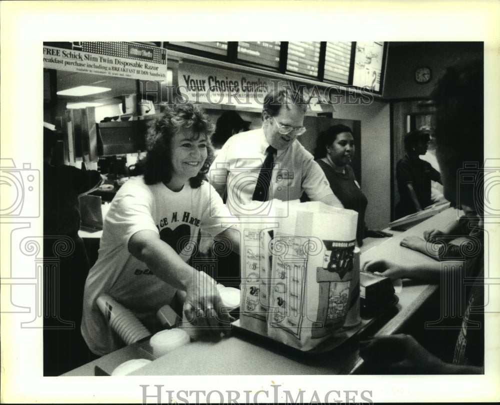 1991 Press Photo Mary Ellen Gravois and Doug Kellogg, Burger King - Historic Images