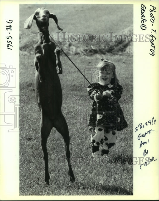 1993 Press Photo Toddler holds goat on a rope - nob24635 - Historic Images